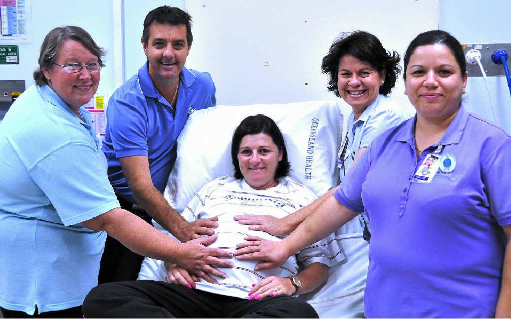 MAGIC TOUCH: Midwives Suzanne Pepper, Ross Newton, Tanya Ogden and Josephine Bell with expecting mother Kara Dixon. MAGIC TOUCH: Midwives Suzanne Pepper, Ross Newton, Tanya Ogden and Josephine Bell with expecting mother Kara Dixon.